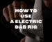 Title graphic featuring a person operating a white electric dab rig with vapor rising, overlaid with bold white text that reads "HOW TO USE A ELECTRIC DAB RIG".
